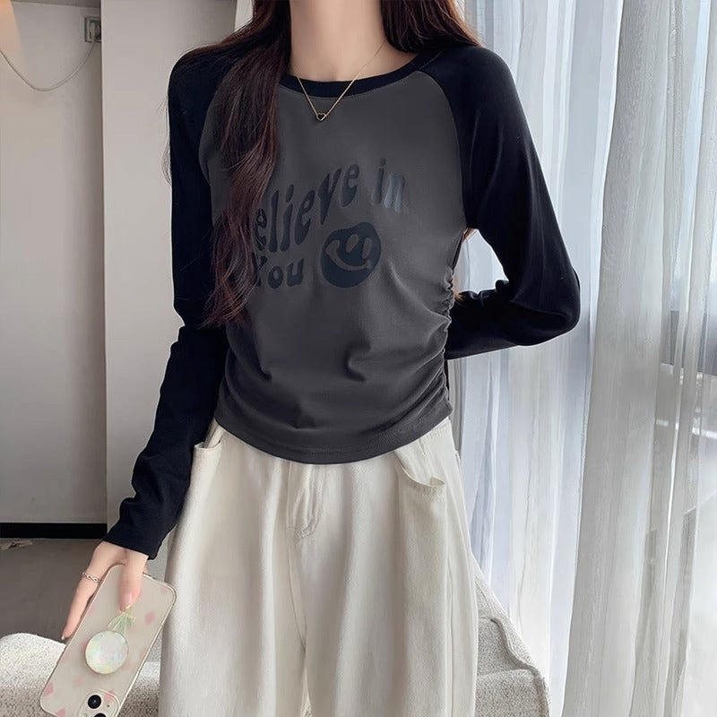 This year's trend is raglan sleeves, pleated waist, long sleeves, slim crew neck, straight shoulder T-shirt, women's pre-fall print base top