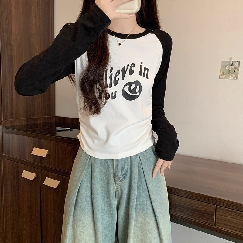 This year's trend is raglan sleeves, pleated waist, long sleeves, slim crew neck, straight shoulder T-shirt, women's pre-fall print base top