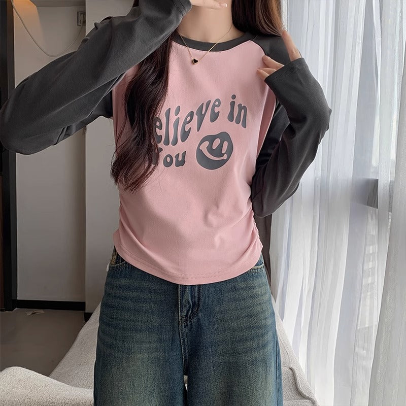 This year's trend is raglan sleeves, pleated waist, long sleeves, slim crew neck, straight shoulder T-shirt, women's pre-fall print base top