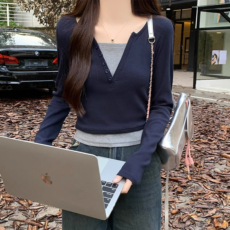 Hot girl style straight shoulder long sleeve T-shirt women's early autumn design sense splicing fake two slim V-neck contrasting colors and versatile clothes