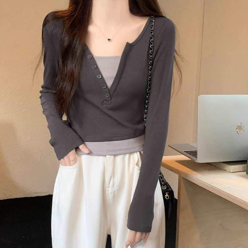 Hot girl style straight shoulder long sleeve T-shirt women's early autumn design sense splicing fake two slim V-neck contrasting colors and versatile clothes