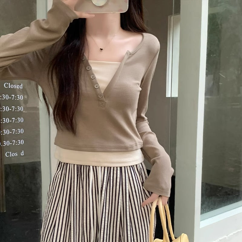 Hot girl style straight shoulder long sleeve T-shirt women's early autumn design sense splicing fake two slim V-neck contrasting colors and versatile clothes