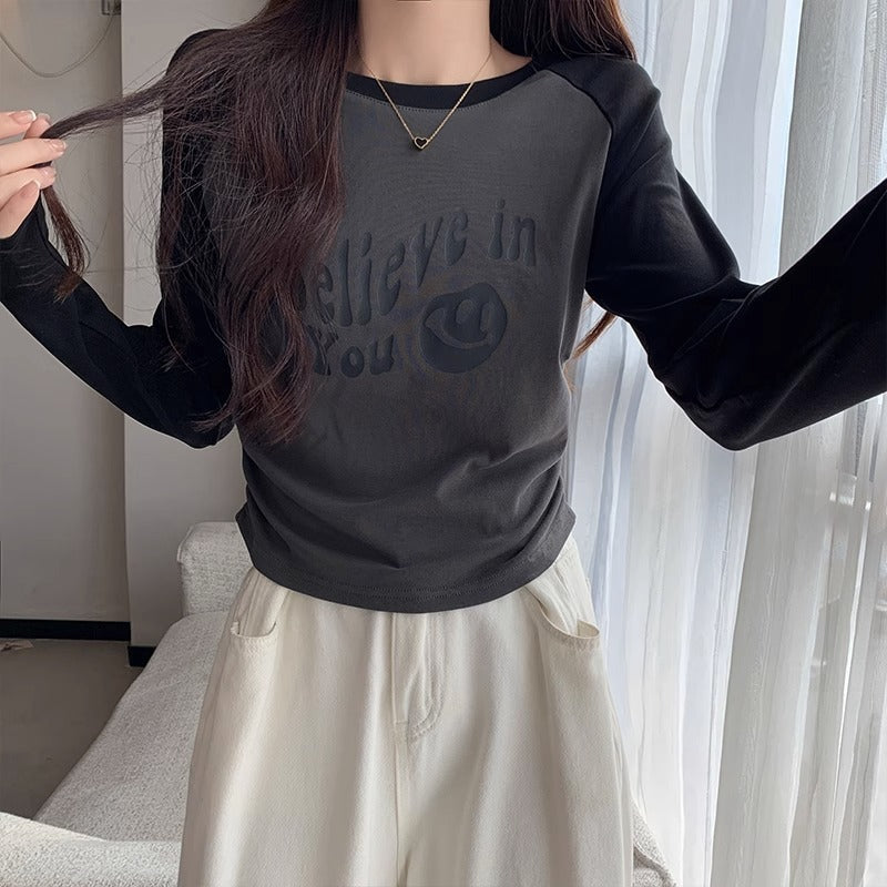 This year's trend is raglan sleeves, pleated waist, long sleeves, slim crew neck, straight shoulder T-shirt, women's pre-fall print base top