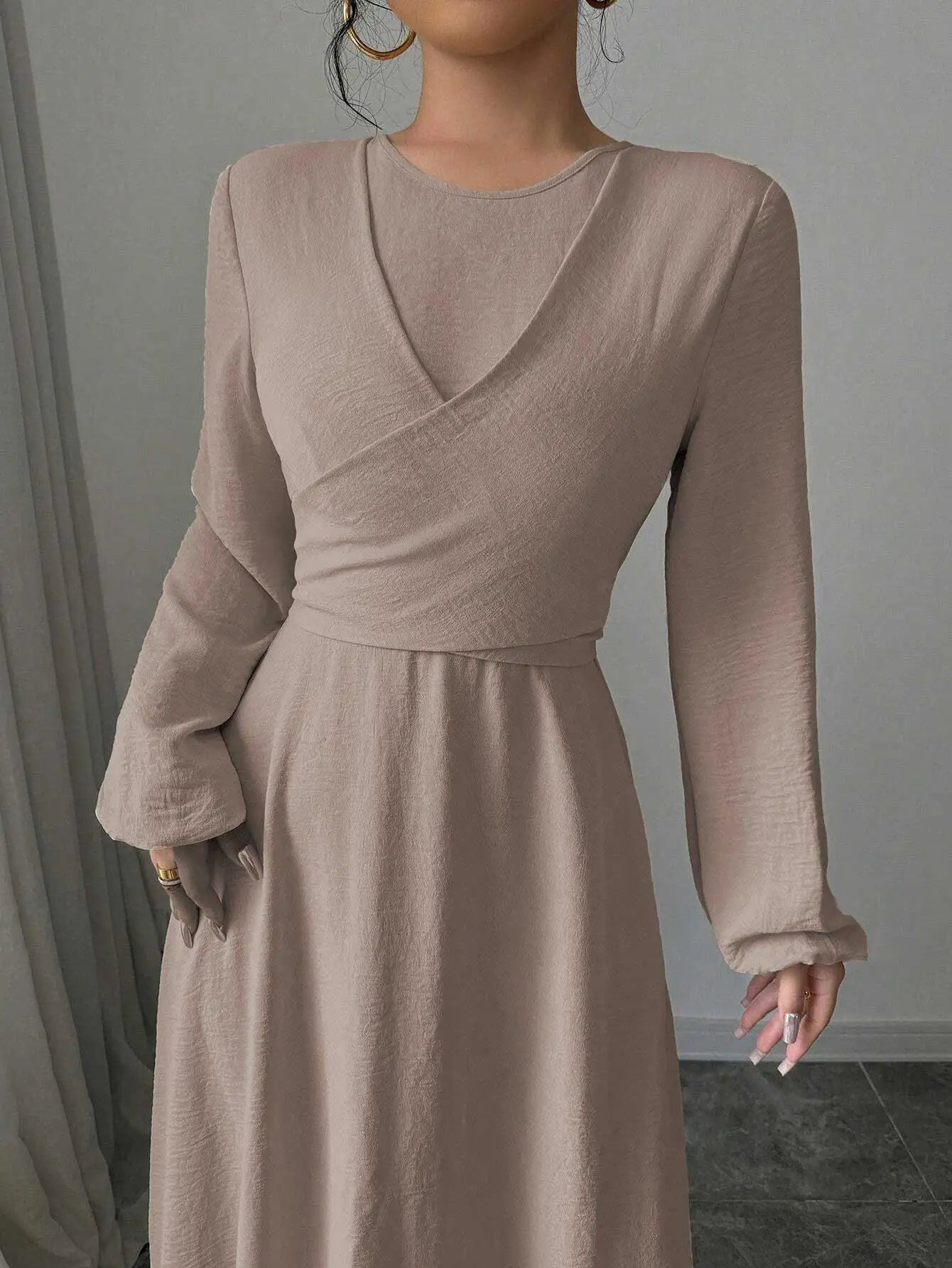 Trendy Modest Dress in Cream Tone Cross Neck and Waist Binding Design Great for Modern Islamic Women's Daily and Occasional Wear