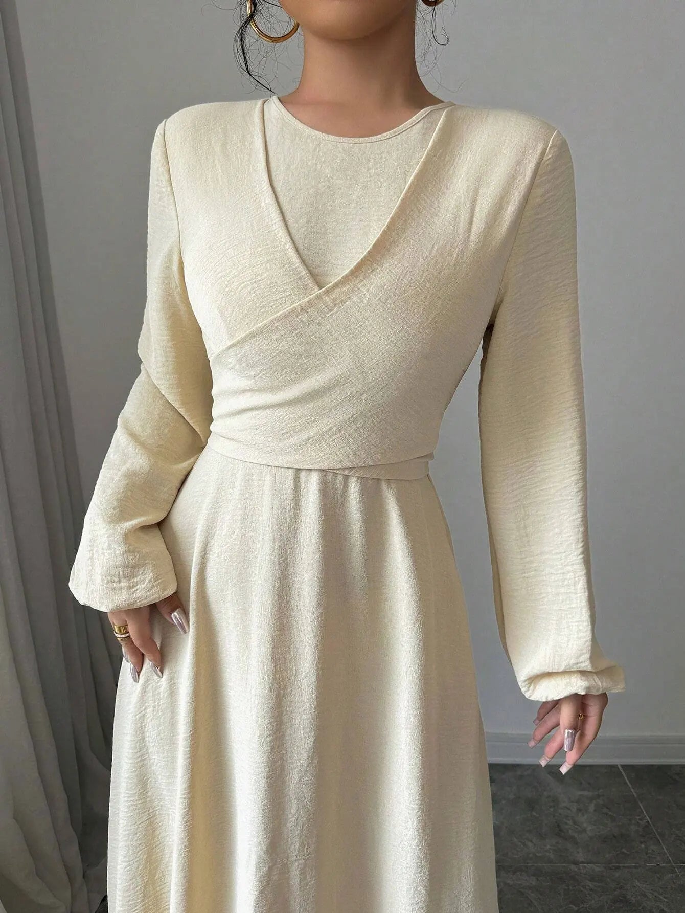 Trendy Modest Dress in Cream Tone Cross Neck and Waist Binding Design Great for Modern Islamic Women's Daily and Occasional Wear