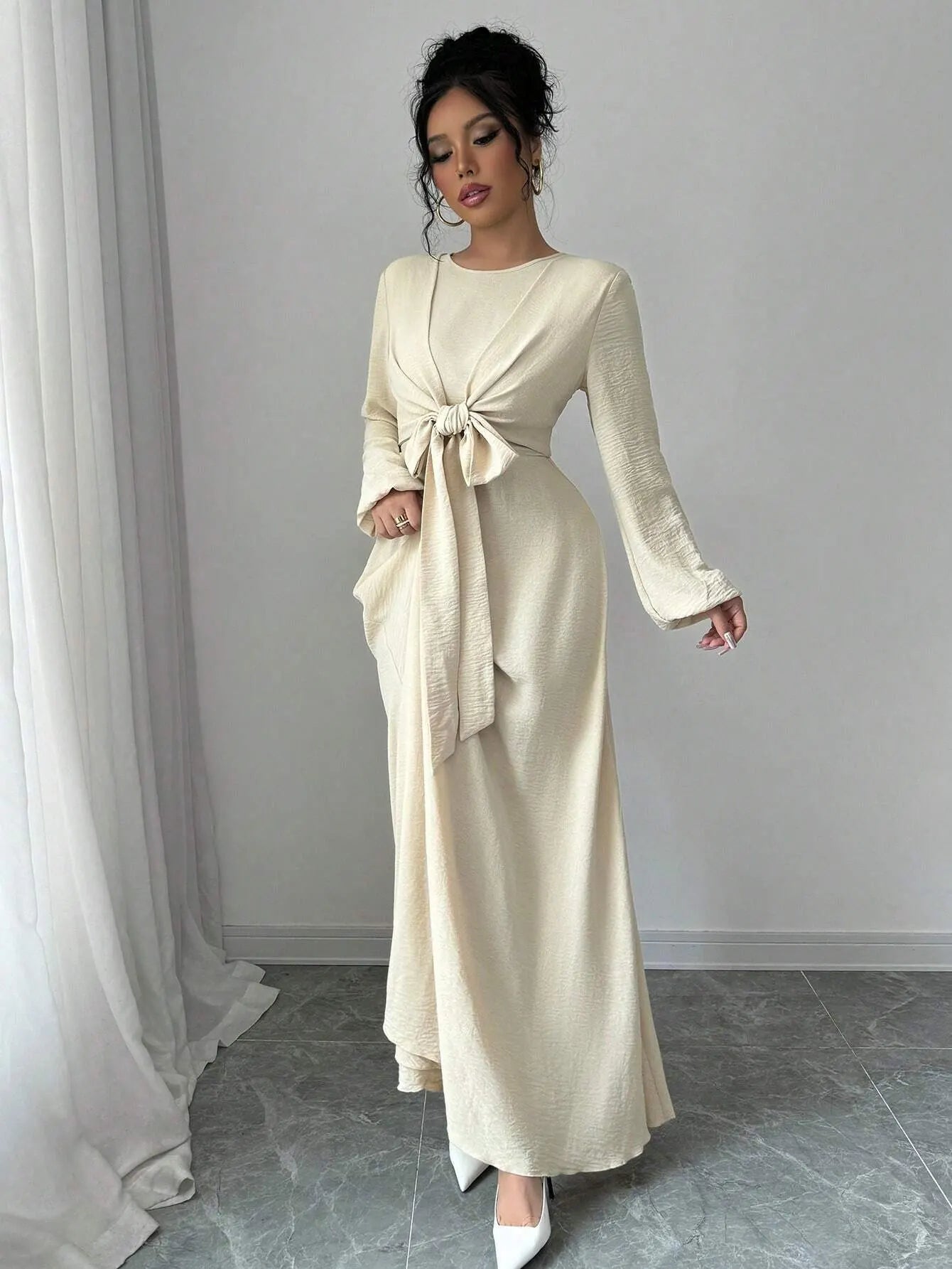 Trendy Modest Dress in Cream Tone Cross Neck and Waist Binding Design Great for Modern Islamic Women's Daily and Occasional Wear