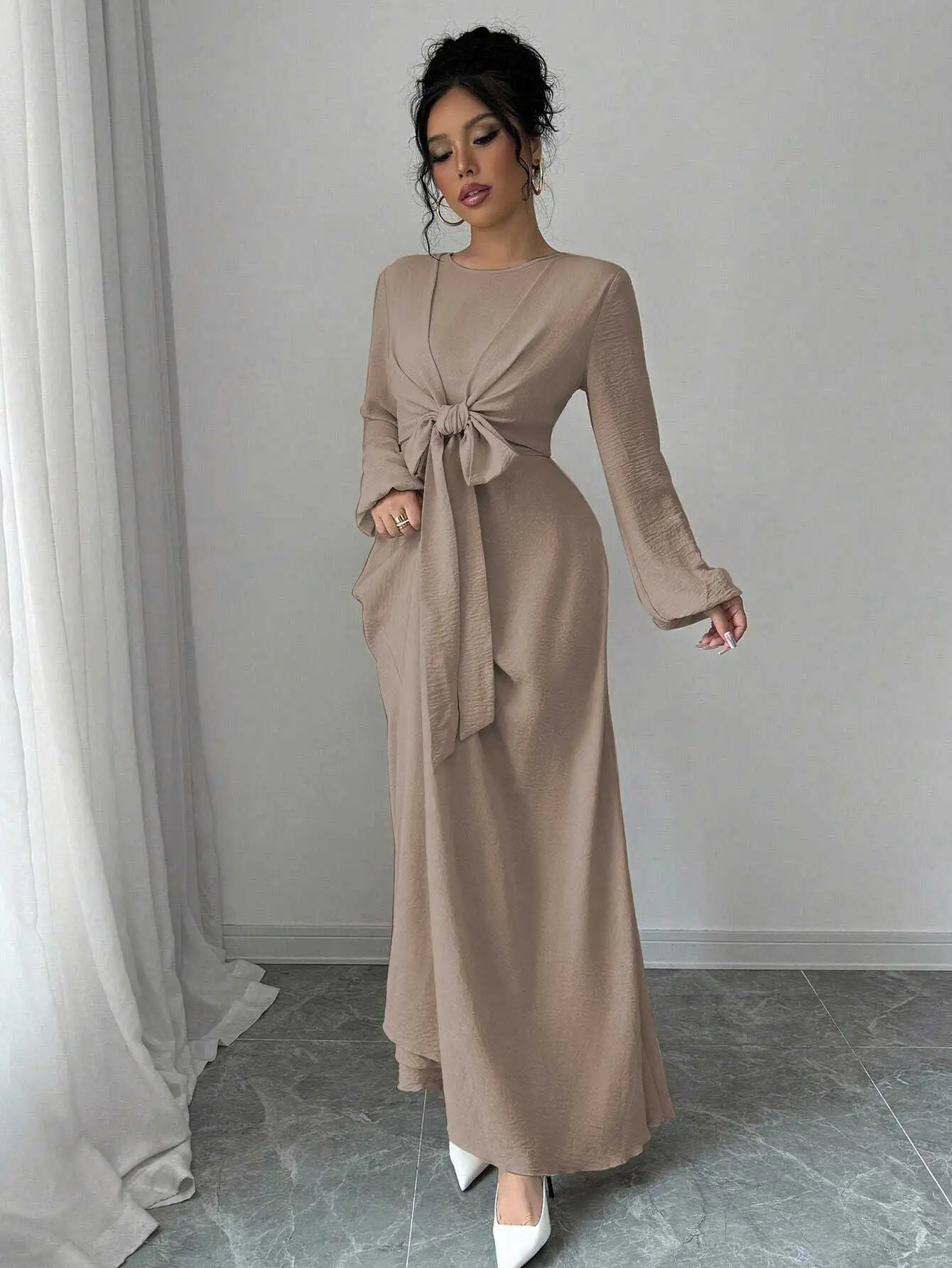 Trendy Modest Dress in Cream Tone Cross Neck and Waist Binding Design Great for Modern Islamic Women's Daily and Occasional Wear