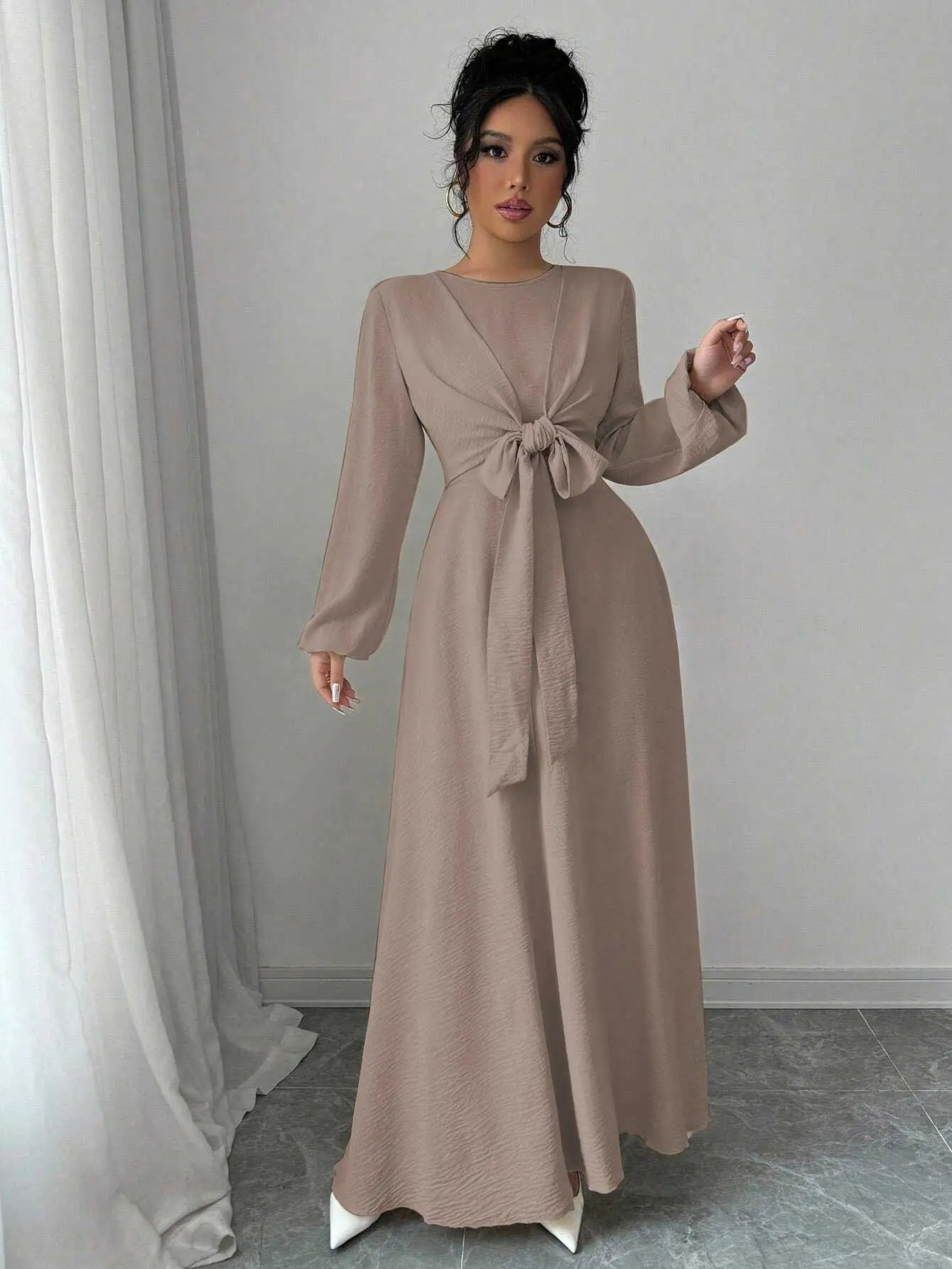 Trendy Modest Dress in Cream Tone Cross Neck and Waist Binding Design Great for Modern Islamic Women's Daily and Occasional Wear